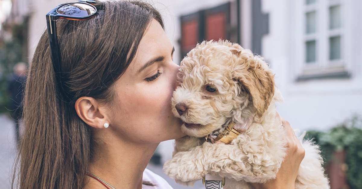 girl with a new puppy
