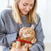 woman with cat. are cats colorblind